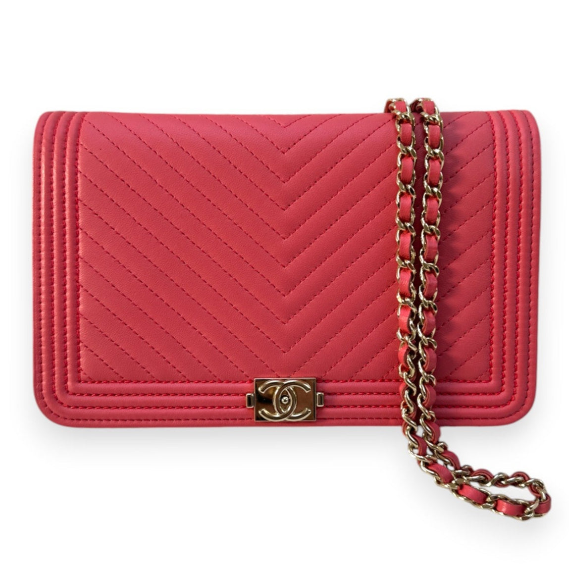 Chanel Boy Chevron WOC rosa in pelle caviar con metalleria champagne